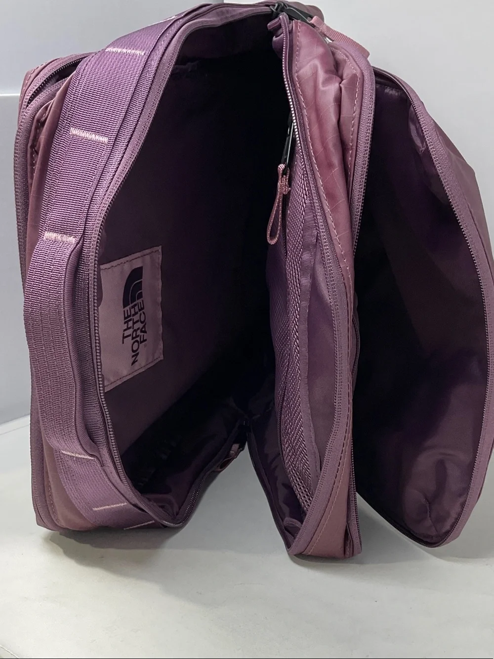 The North Face Backpack in Plum with Pink Logo